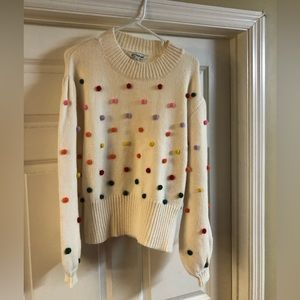 Sweater with pom dots